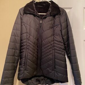 Womens Black The North Face jacket. Reversible. Size medium. Perfect condition.